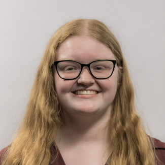 A headshot of Tatum Beyer.