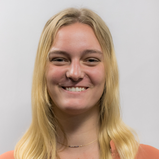 A headshot of Mia Case.