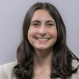 A headshot of Clara Divincenzo.