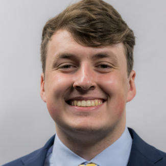 A headshot of Jonathan Douglas.