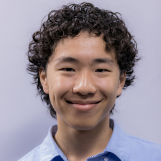 A headshot of Michael Han.