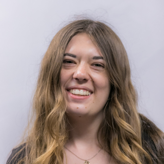 A headshot of Taylor Hart.