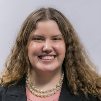 A headshot of Jordan Howell.