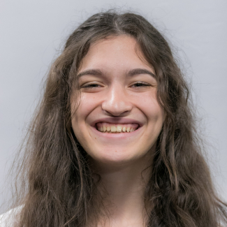 A headshot of Samantha Kratman.