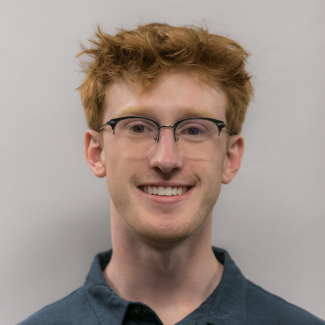 A headshot of Miles Lubas.