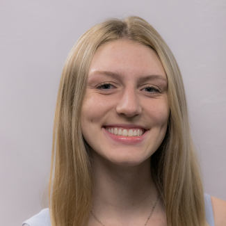 A headshot of Kylie Marozsan.