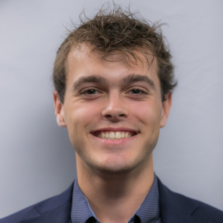 A headshot of Liam McKenna.