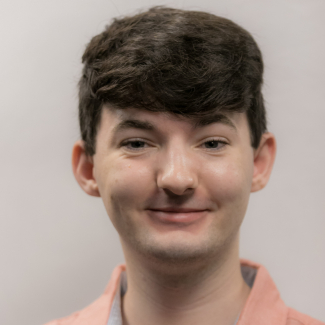 A headshot of Eliot Morrow.