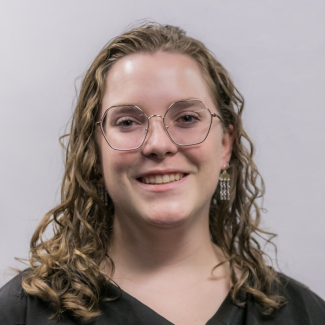 A headshot of Megan Neumann.