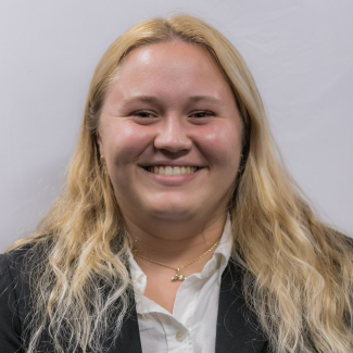 A headshot of Elizabeth Pellegrini.