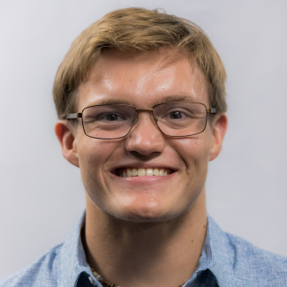 A headshot of Aidan Pflieger.