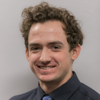 A headshot of Charlie Remmers.