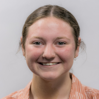 A headshot of Riley Stoppa.