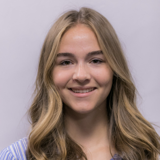 A headshot of Coral Tolman.