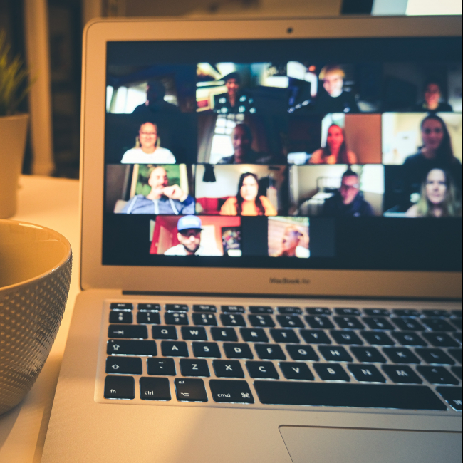 laptop showing conferencing windows